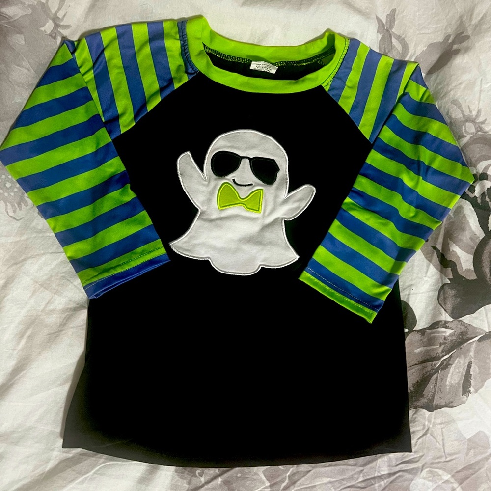 Long sleeve shirt. The size is 6/7T 
Only worn once
Bought from online Boutique